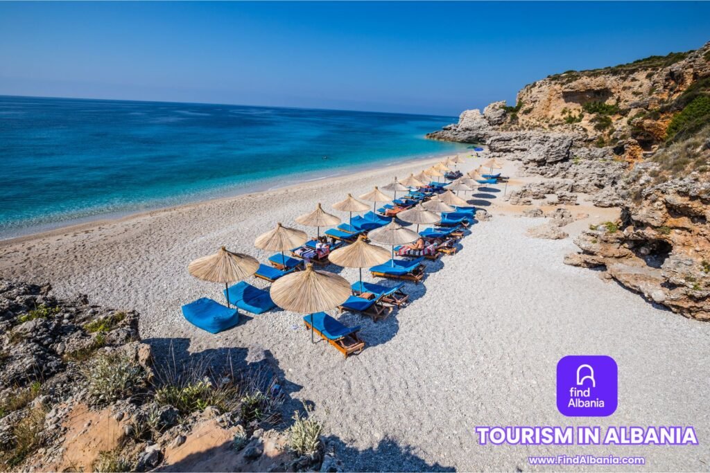 Tourism in Albania – panoramic view of Albanian Riviera coastline with mountains and crystal-clear sea
