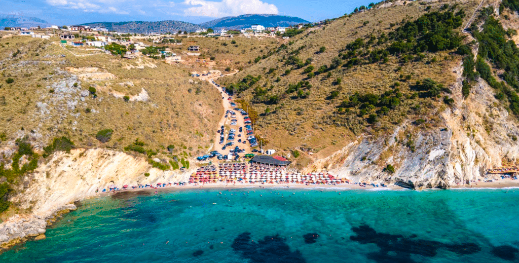 Aerial view of Mirror Beach Albania with turquoise water and surrounding cliffs