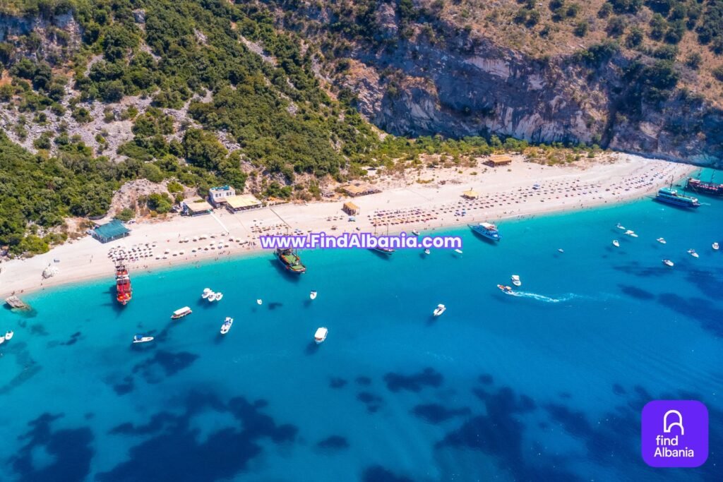 Turquoise waters and rocky cliffs of Krorëza Beach Saranda, Albania